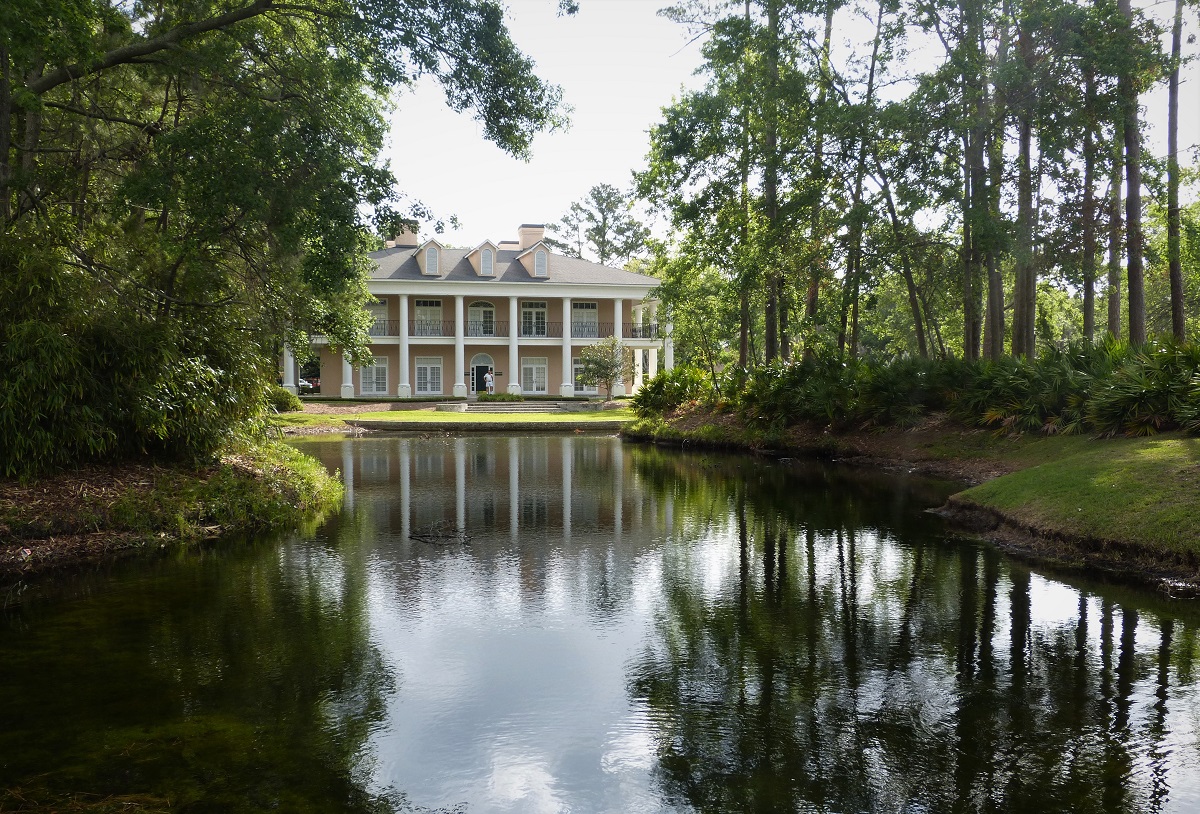 A big house on the banks of a river