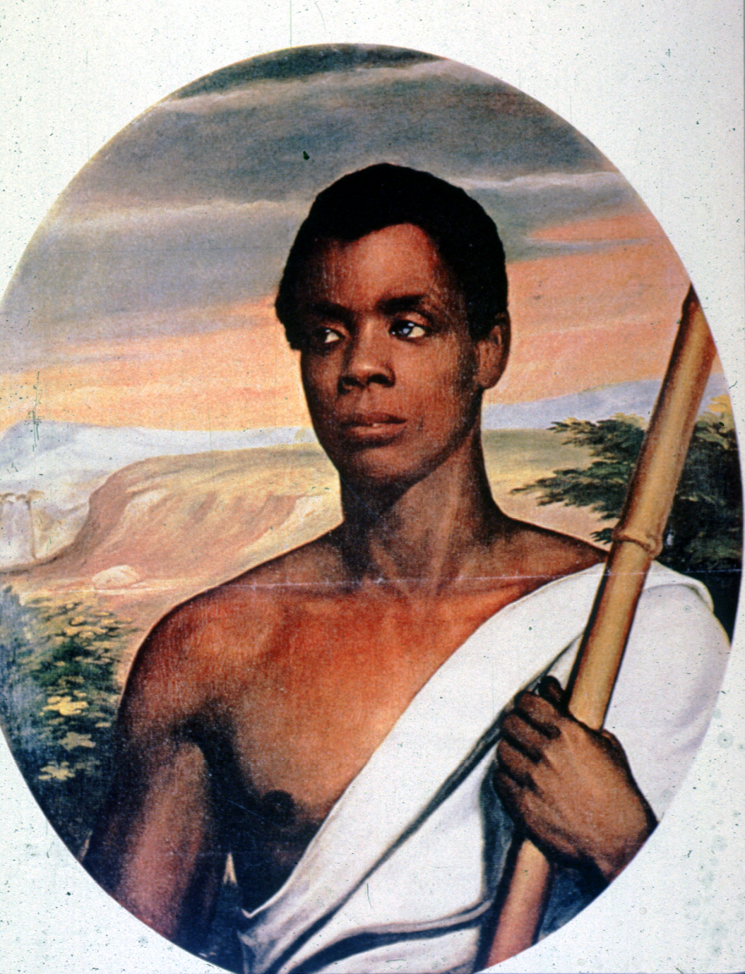 Portrait of an African man holding a staff