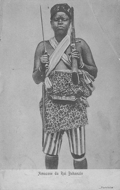 A woman resting a gun and a sword on shoulders